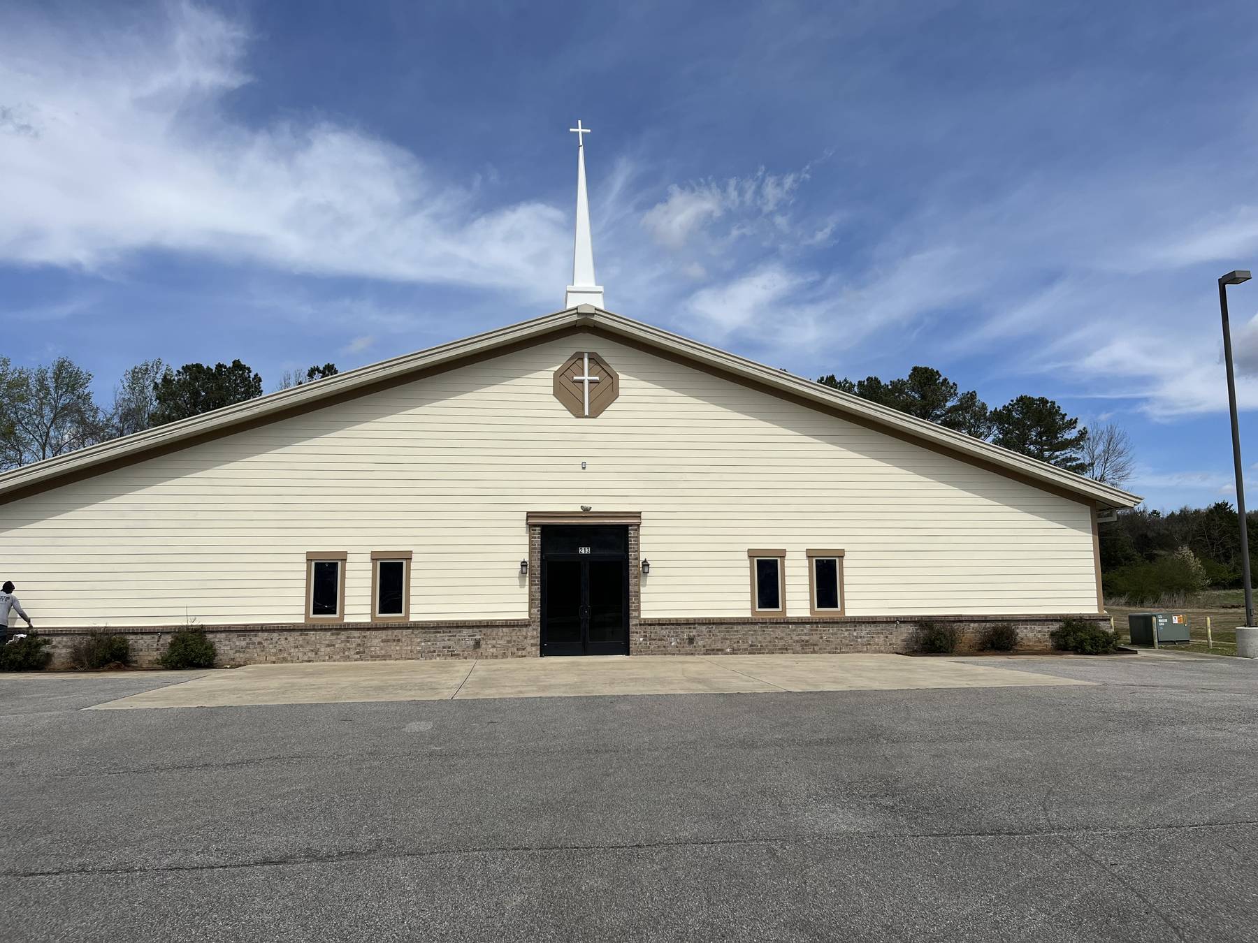 Flint River Church today on Winchester Road, a cream-colored building with a white steeple
